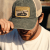 Keps - Black River Racer Washed Trucker (mörkgrön/creme)